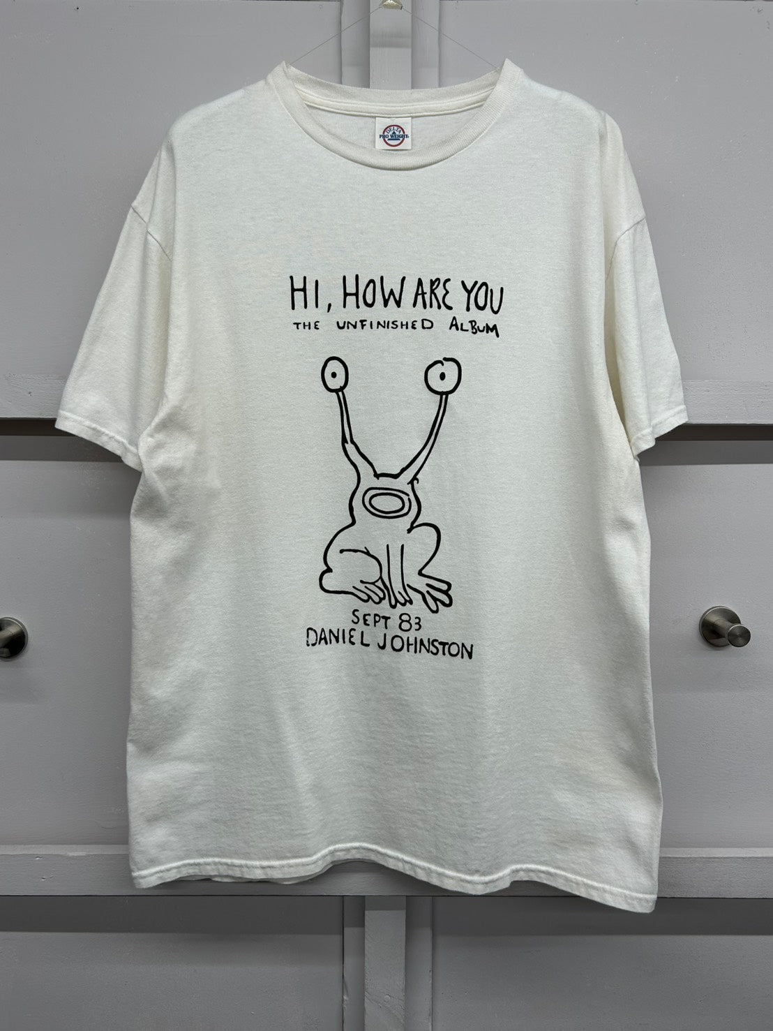 【USED】00s' Daniel Johnston 『Hi, How Are You』 Album Cover プリントTシャツ